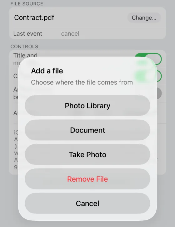 The action sheet in the middle of the screen with a Cancel row on iOS 26